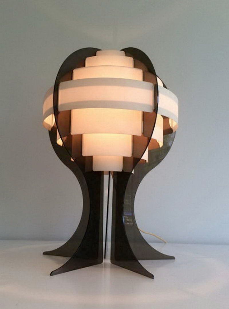Modernist lamp in plexiglass and white plastic strips.