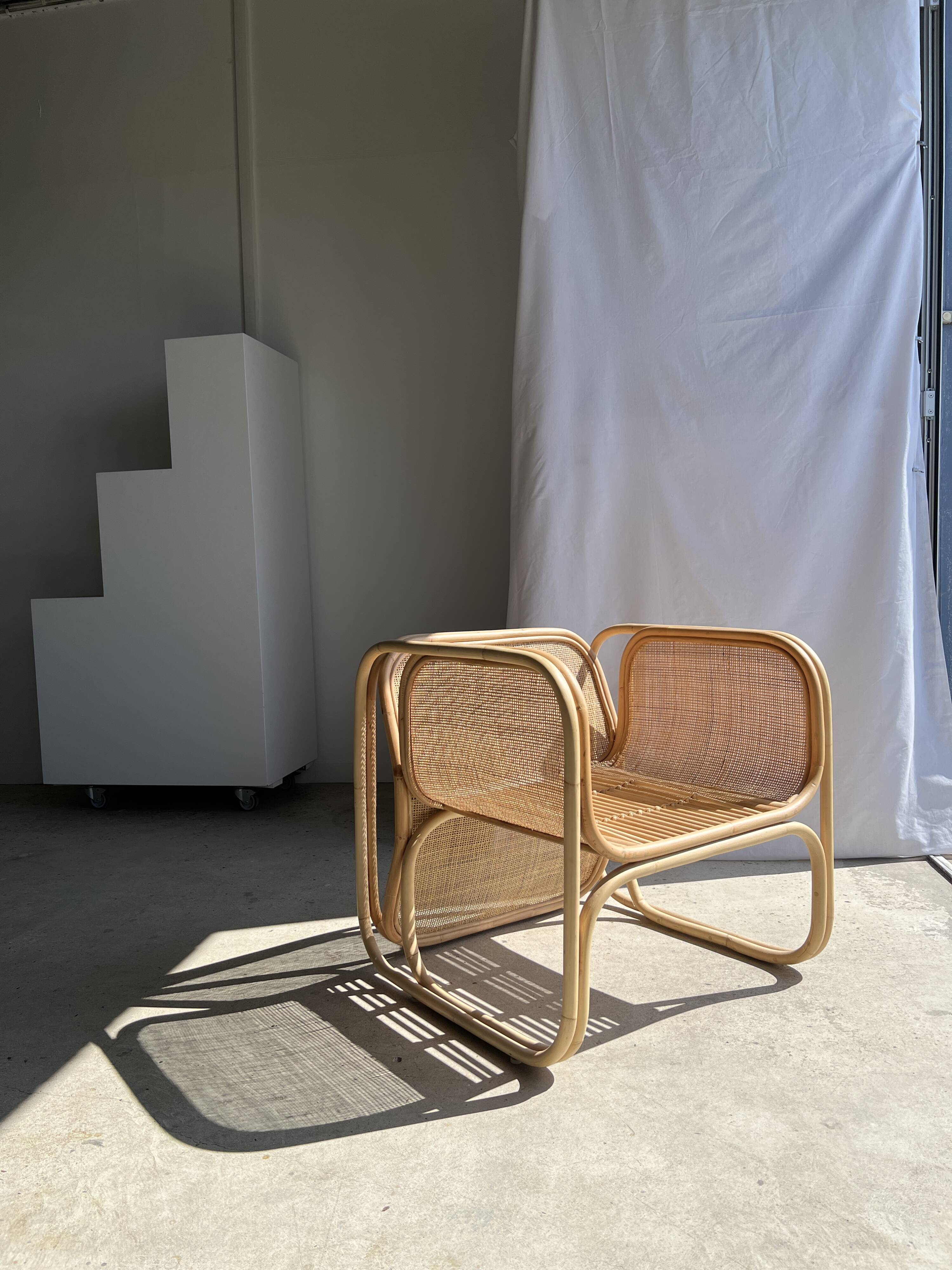 Amsterdam rattan armchair with U-shaped armrest, squared canework