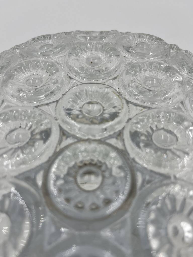 Molded glass ceiling light with relief