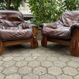 2 Brutalist armchairs in wood and leather 1970