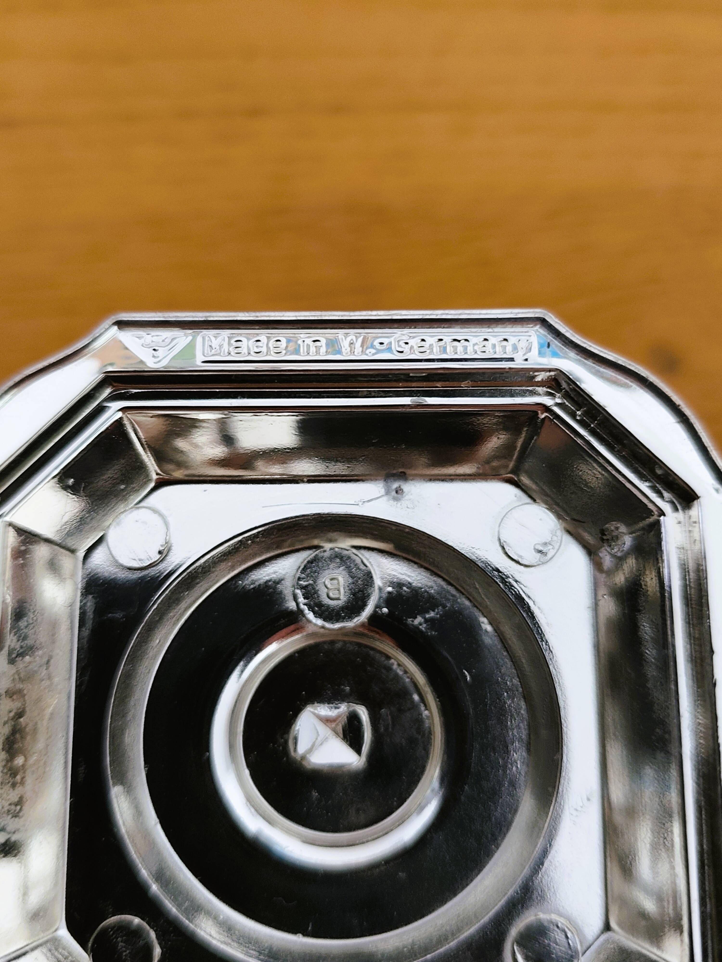 Pair of antique silver-plated candlesticks