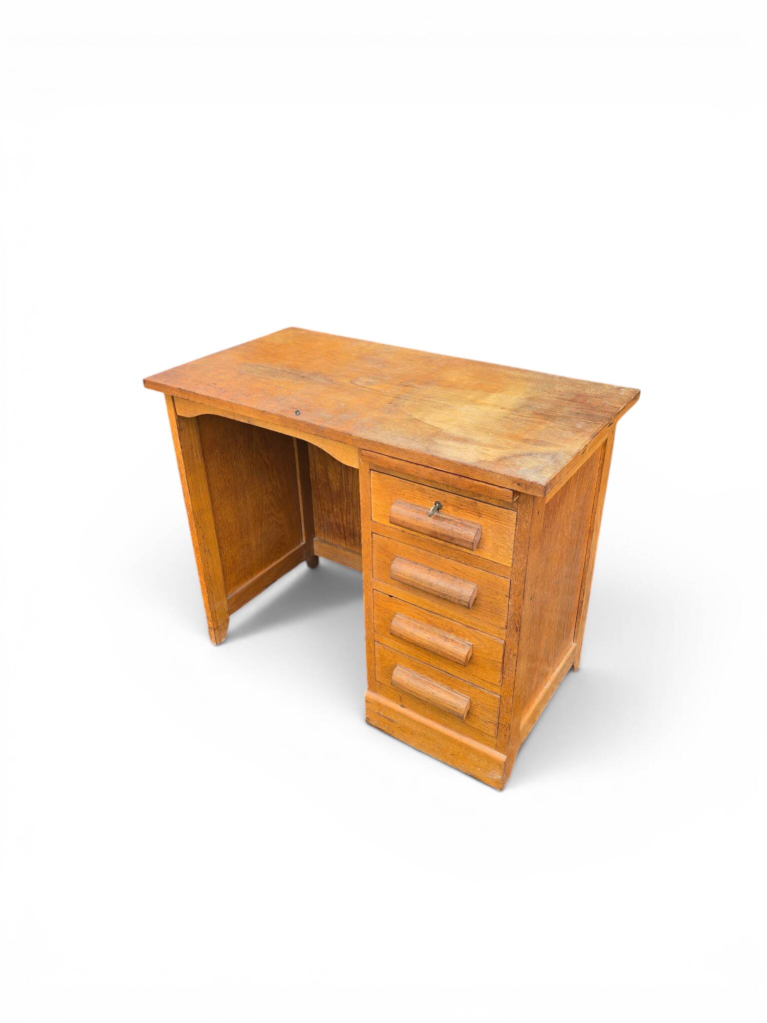 Vintage oak desk with a drawer unit and sliding shelf.