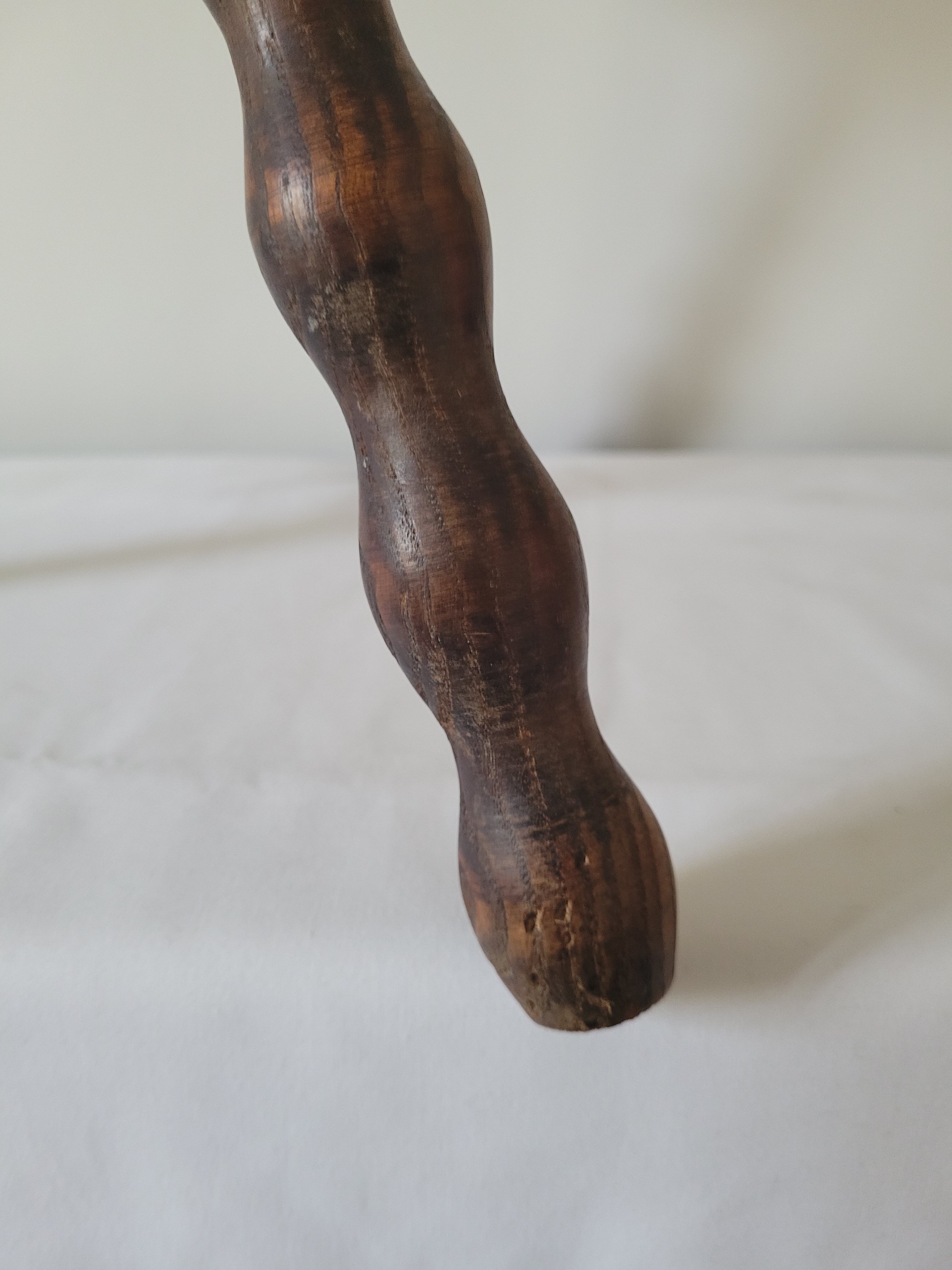 Tripod stool with turned wooden legs