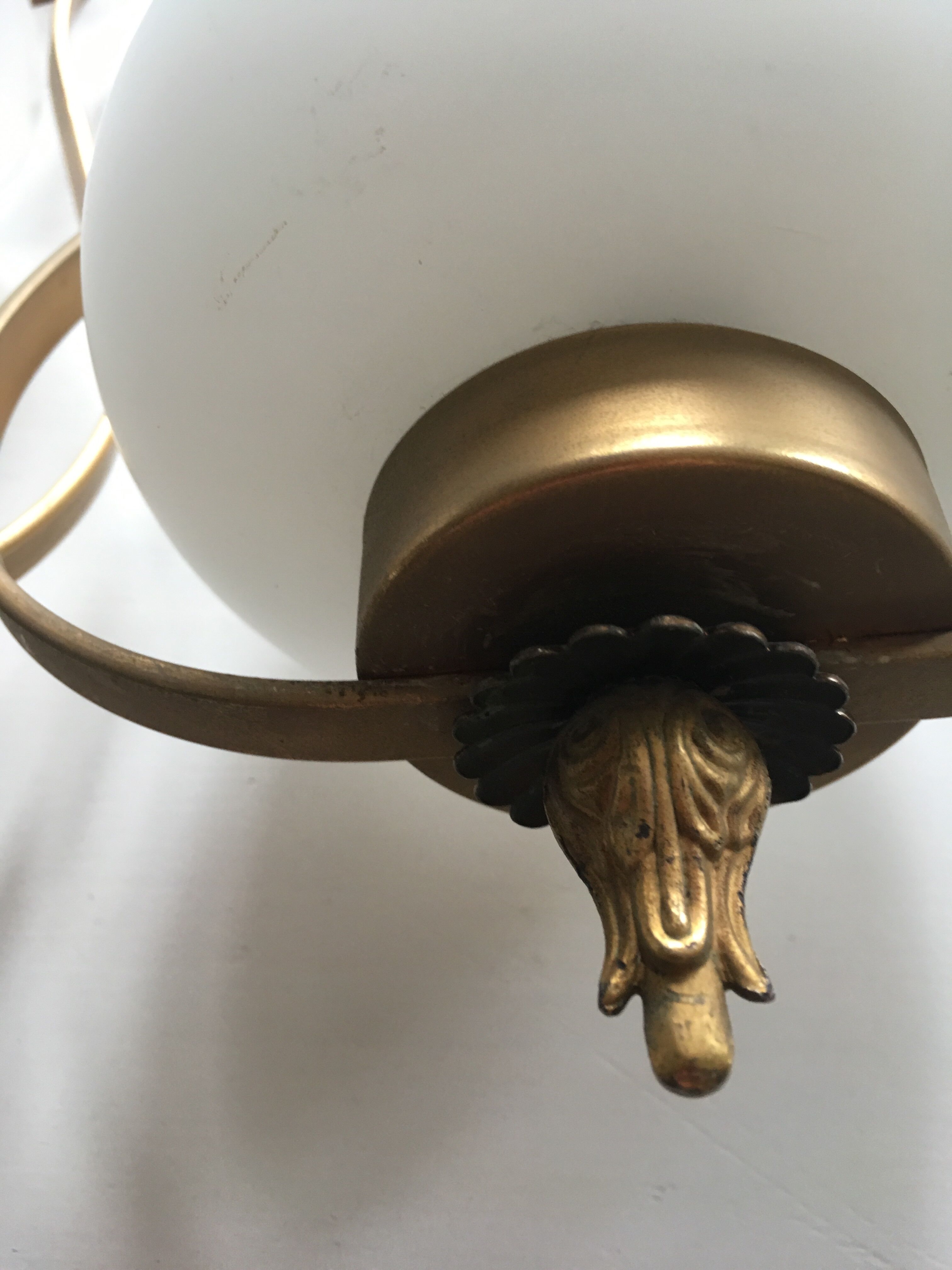 Pair of white tulip and brass pendant lamps