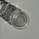 Small glass bottle vase with engraved geometric patterns vintage H16.5