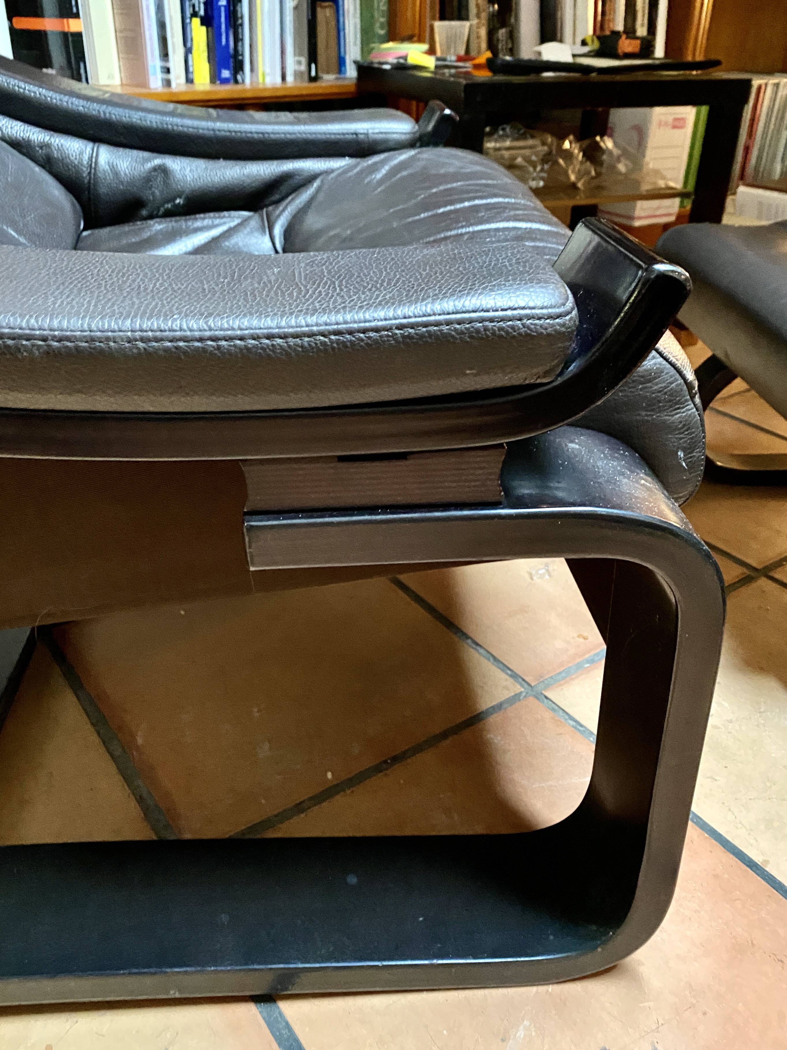 Pair of armchairs and their ottomans by ake fribytter for nelo sweden 1970