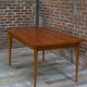 Teak dining table design by Johannes Andersen for Samcom 60s