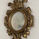 Old mirror in gilded wood