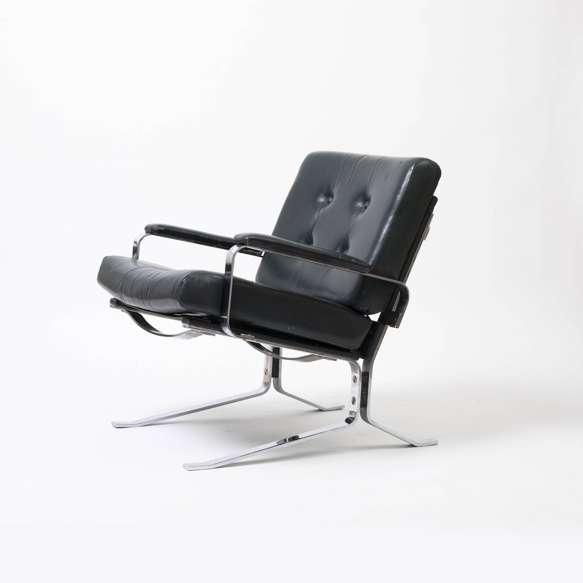 Green leather and chrome lounge chair, 1970s