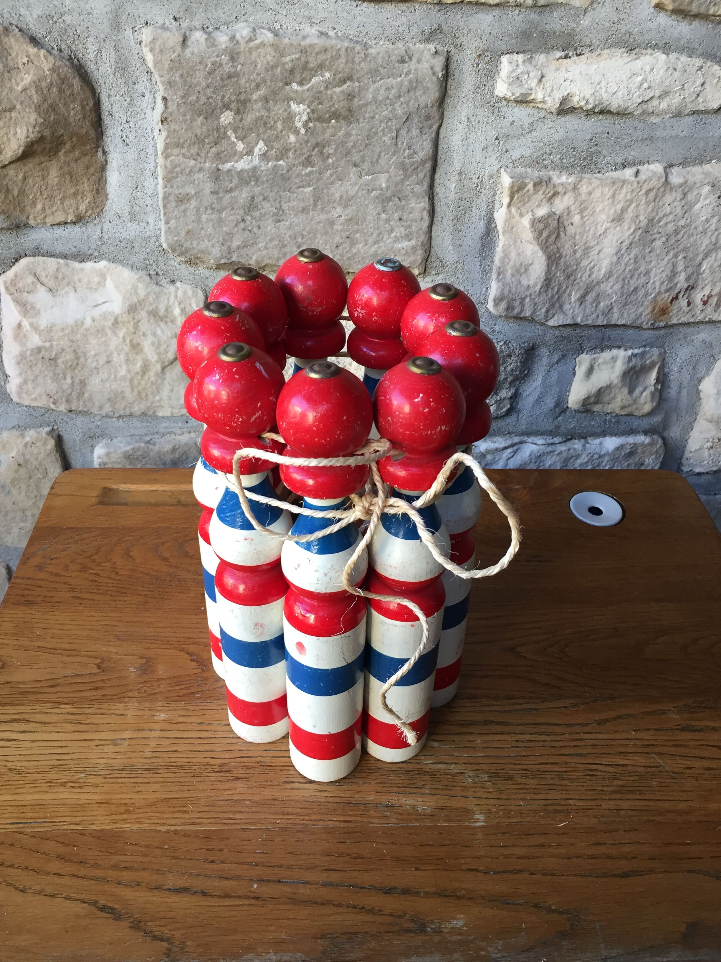 Old vintage wooden bowling game triclore plus two balls