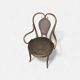 Antique curved wooden armchair with caning – Bistro style