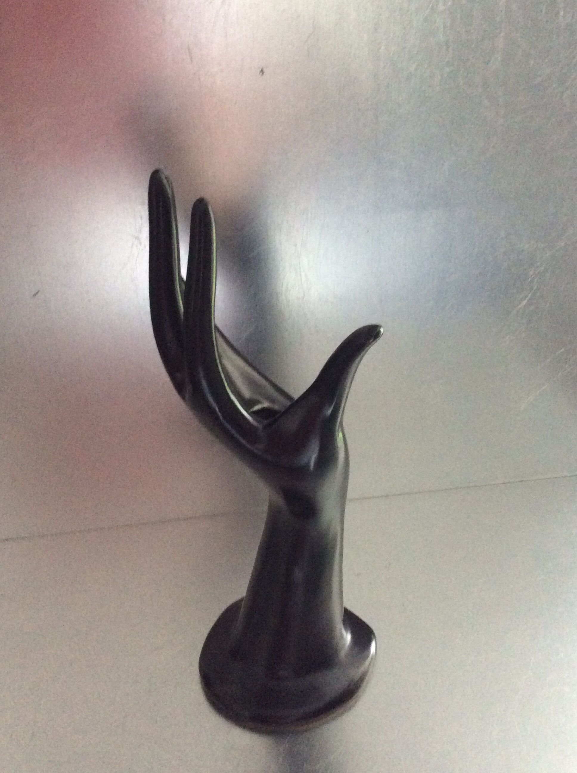 Vintage black ceramic hand