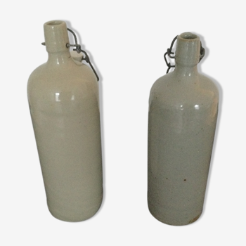 Bottles in light beige sandstone