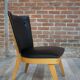 Chair 50 years in wood and faux black leather cocktail