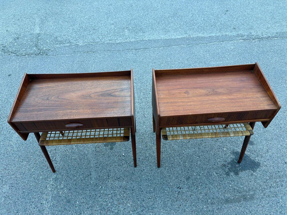 Modernist Danish teak bedside tables with rattan shelves, set of 2
