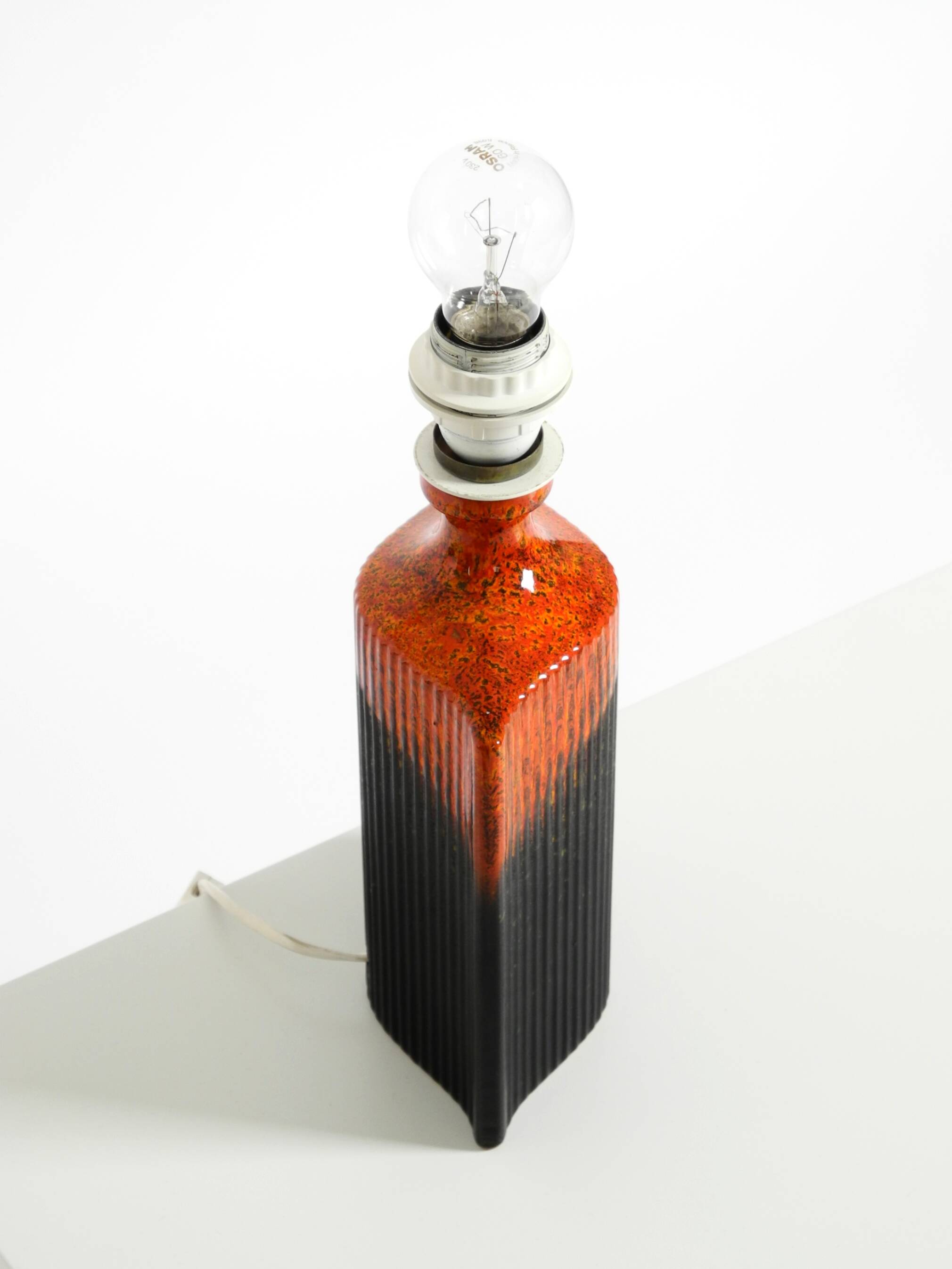 Unique 1960s ceramic table lamp in red and black by Kaiser Leuchten