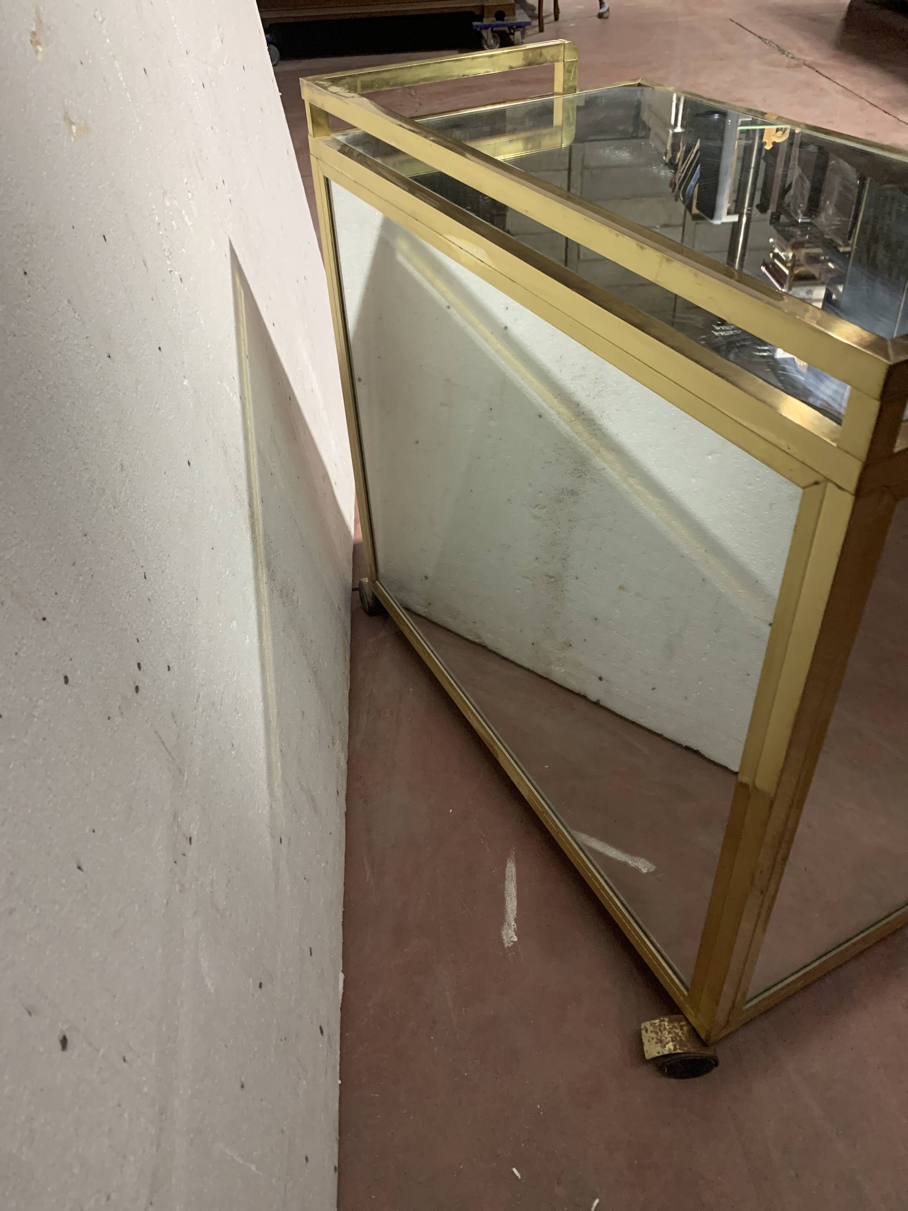 1970s brass bar with a mirrored front from the 20th century.