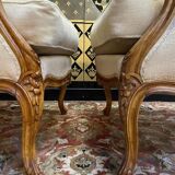 Paire de fauteuils bergères gondoles de style Louis XV