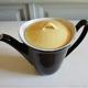 50s black and yellow ceramic teapot