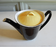 50s black and yellow ceramic teapot