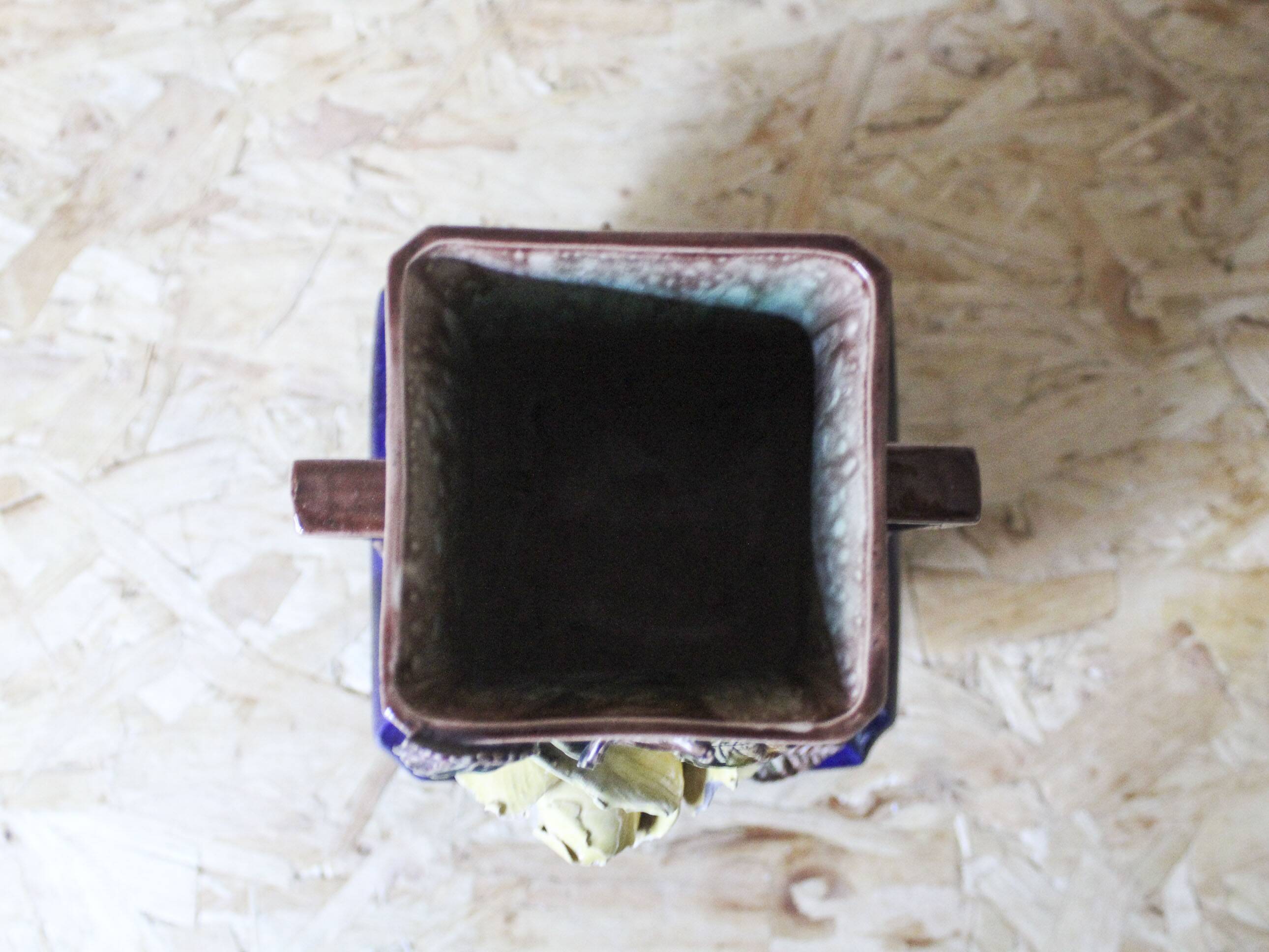 Slip vase decorated with flowers