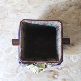 Slip vase decorated with flowers