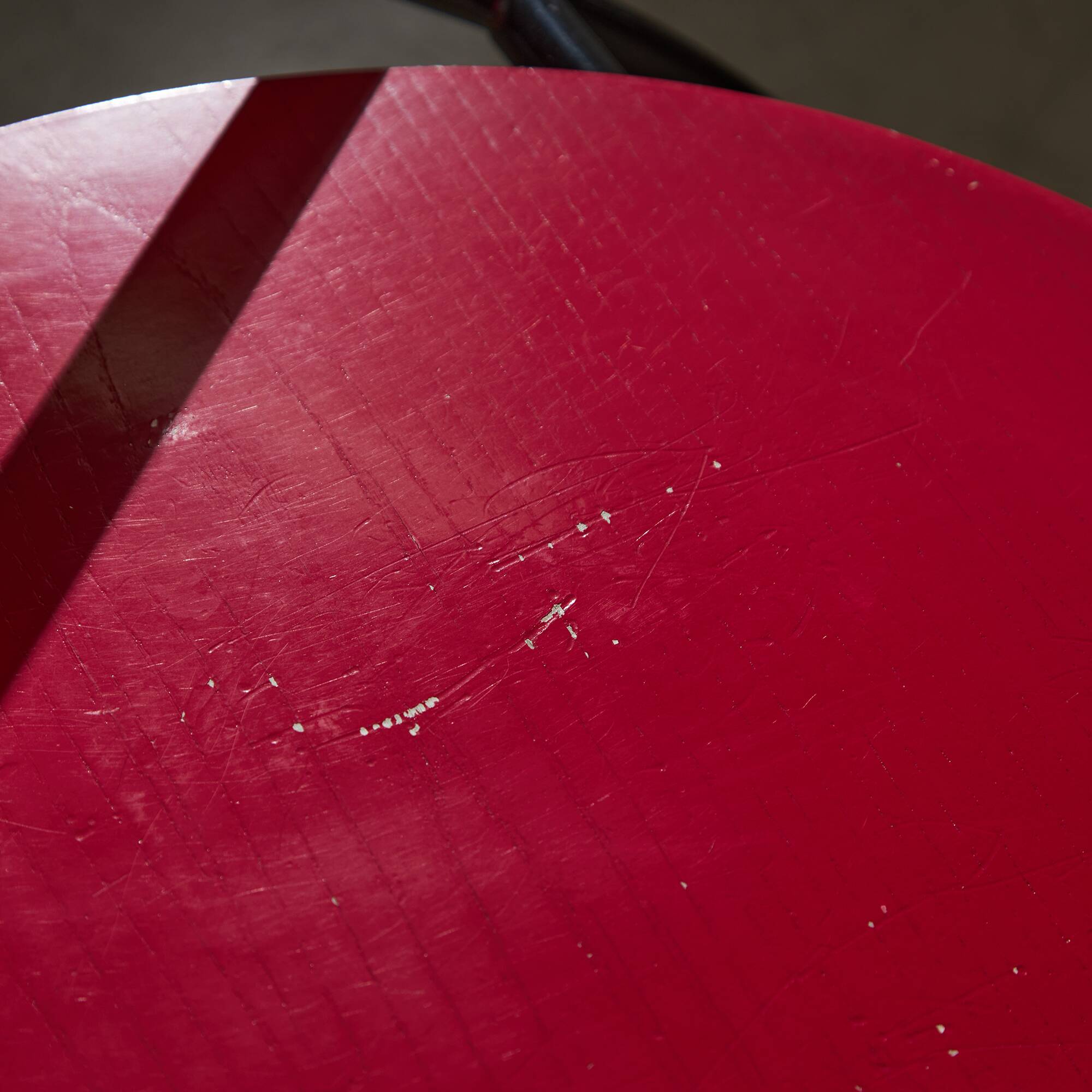 Red Plywood and Curved Metal Frame Chair