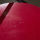 Red Plywood and Curved Metal Frame Chair