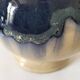 handcrafted ceramic jug with navy blue drip glaze.