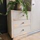 Asymmetrical cabinet