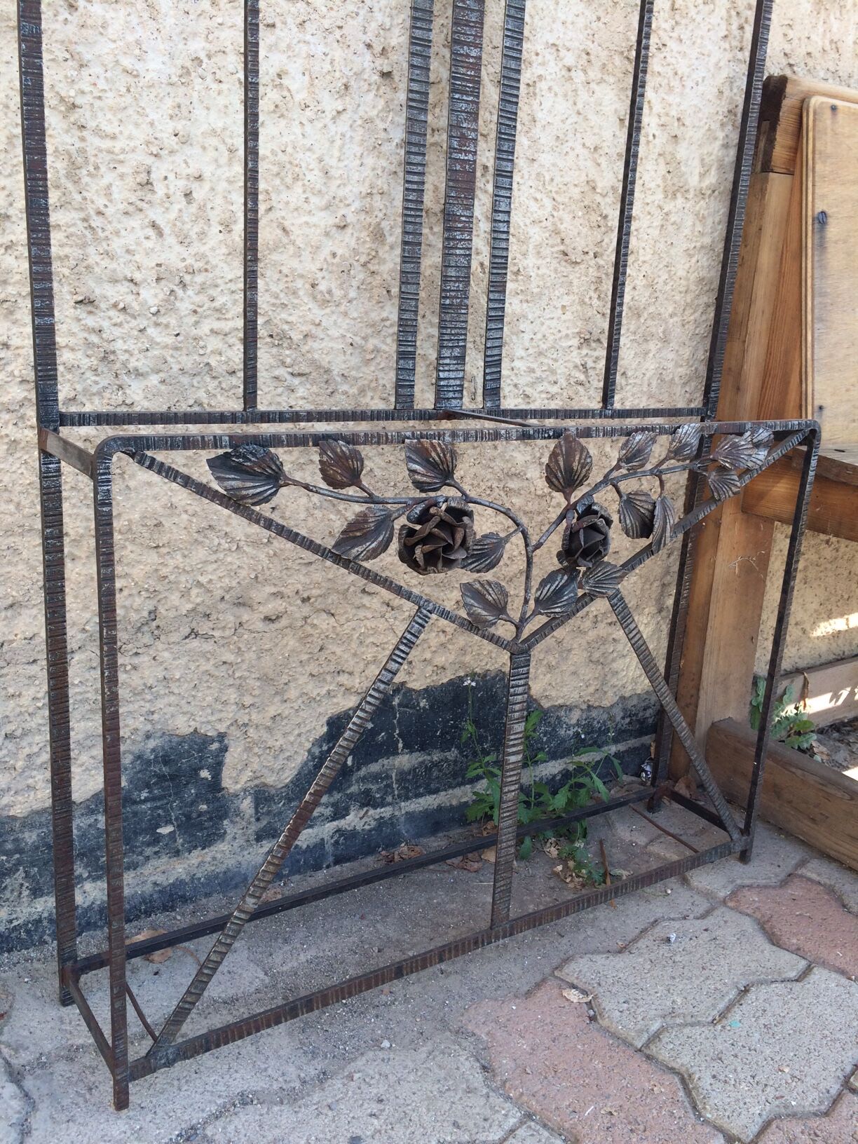 Old Art Deco coat rack in hammered iron