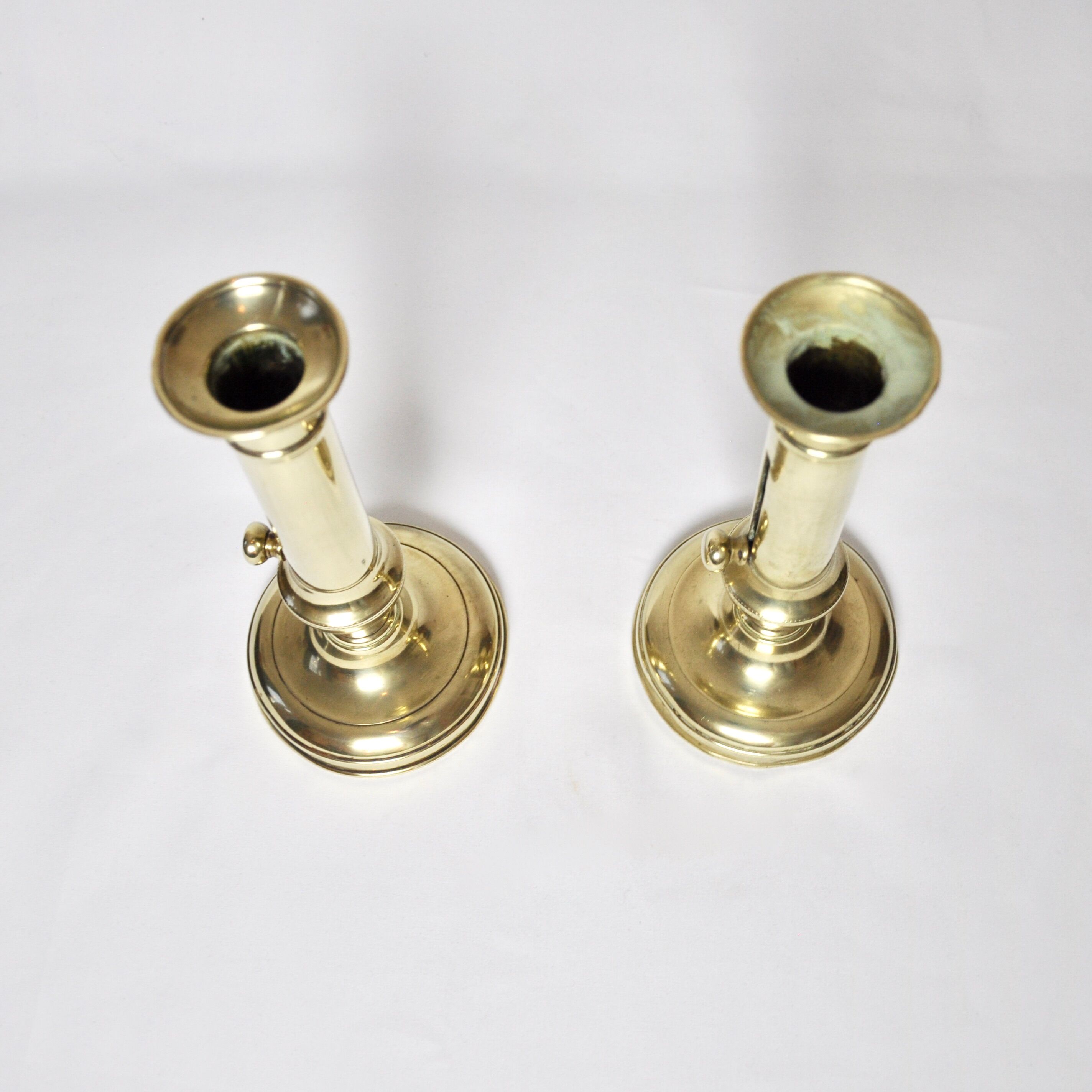 2 adjustable brass candlesticks