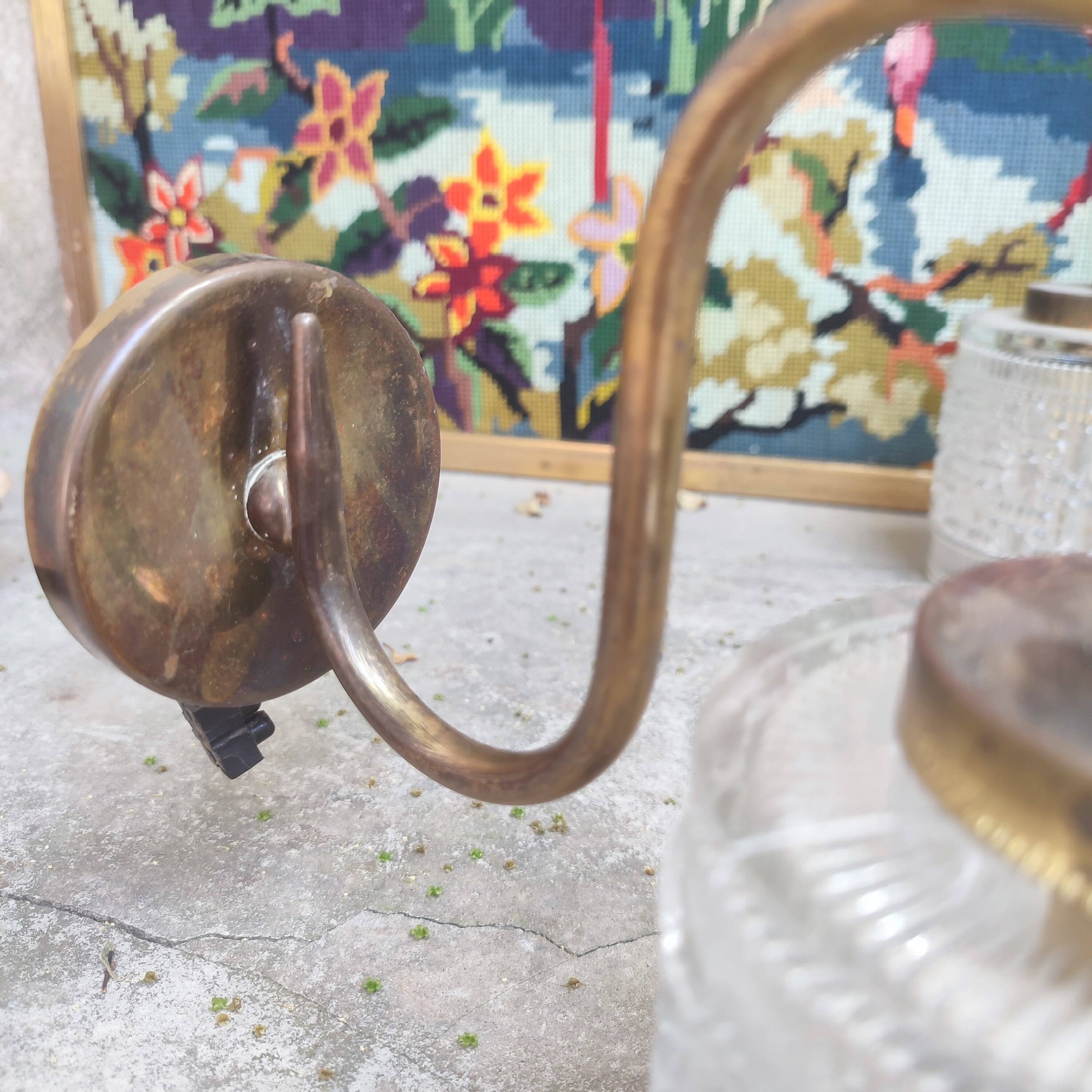 Pair of cylindrical tulip wall lights from the 1950s.