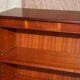Pair of open low bookshelves Shaws of London in hardwood.