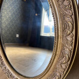 Old beveled oval mirror
