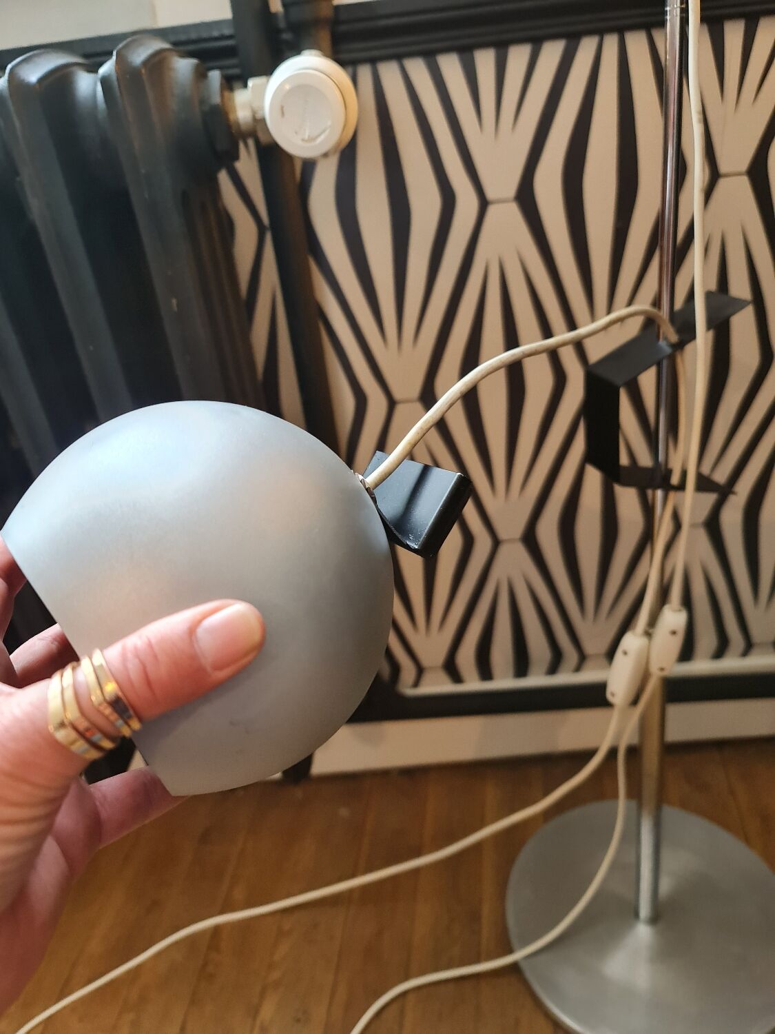 Two-light floor lamp with removable magnetic Eyes Ball.
