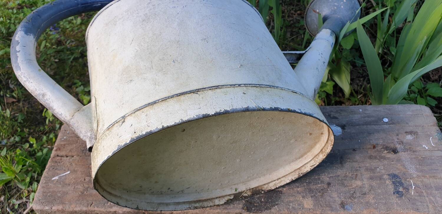 White zinc watering can