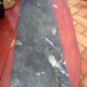 White veined black marble fireplace