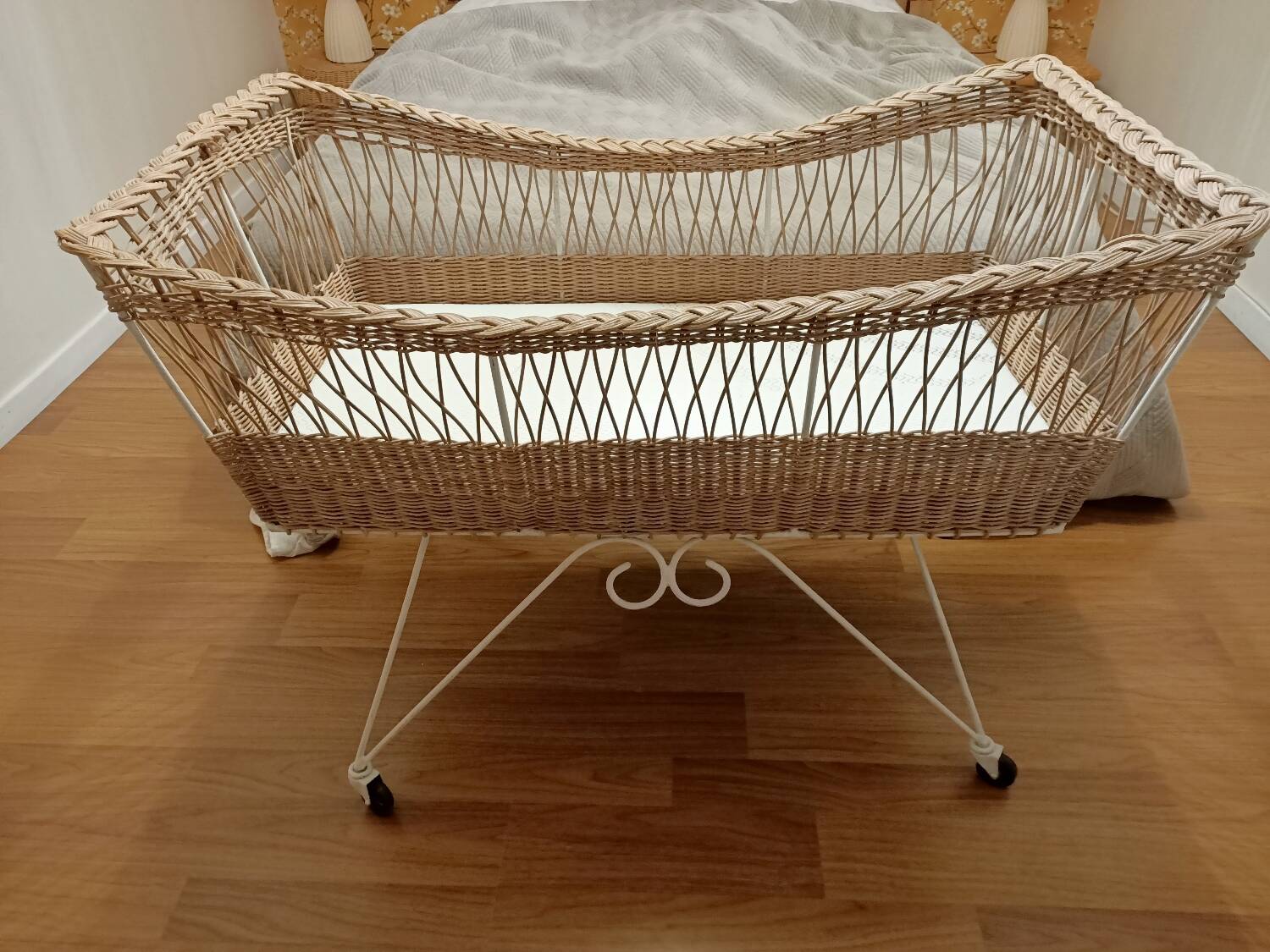 Rattan and wrought iron cradle