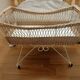Rattan and wrought iron cradle