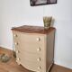 Chest of drawers with rounded front