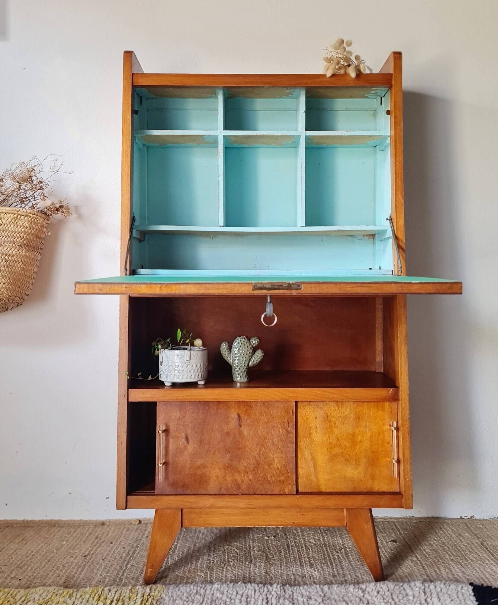 Vintage 1950s wooden secretary with tapered legs and mint interior.