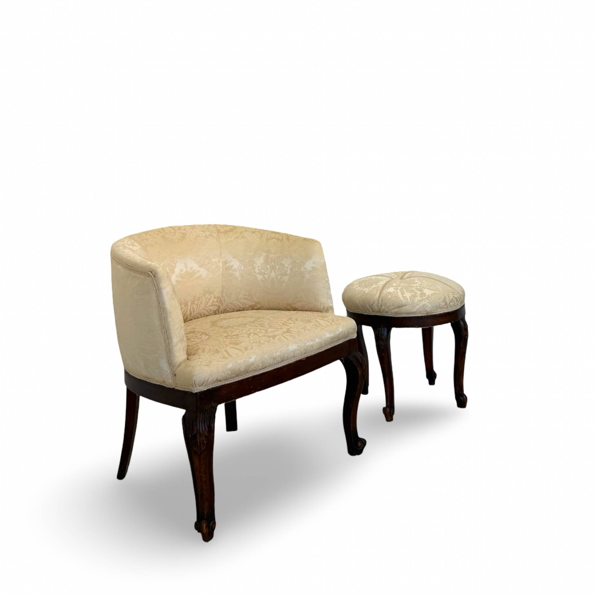 An antique Italian bar chair and a matching tufted vanity stool.