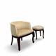 An antique Italian bar chair and a matching tufted vanity stool.