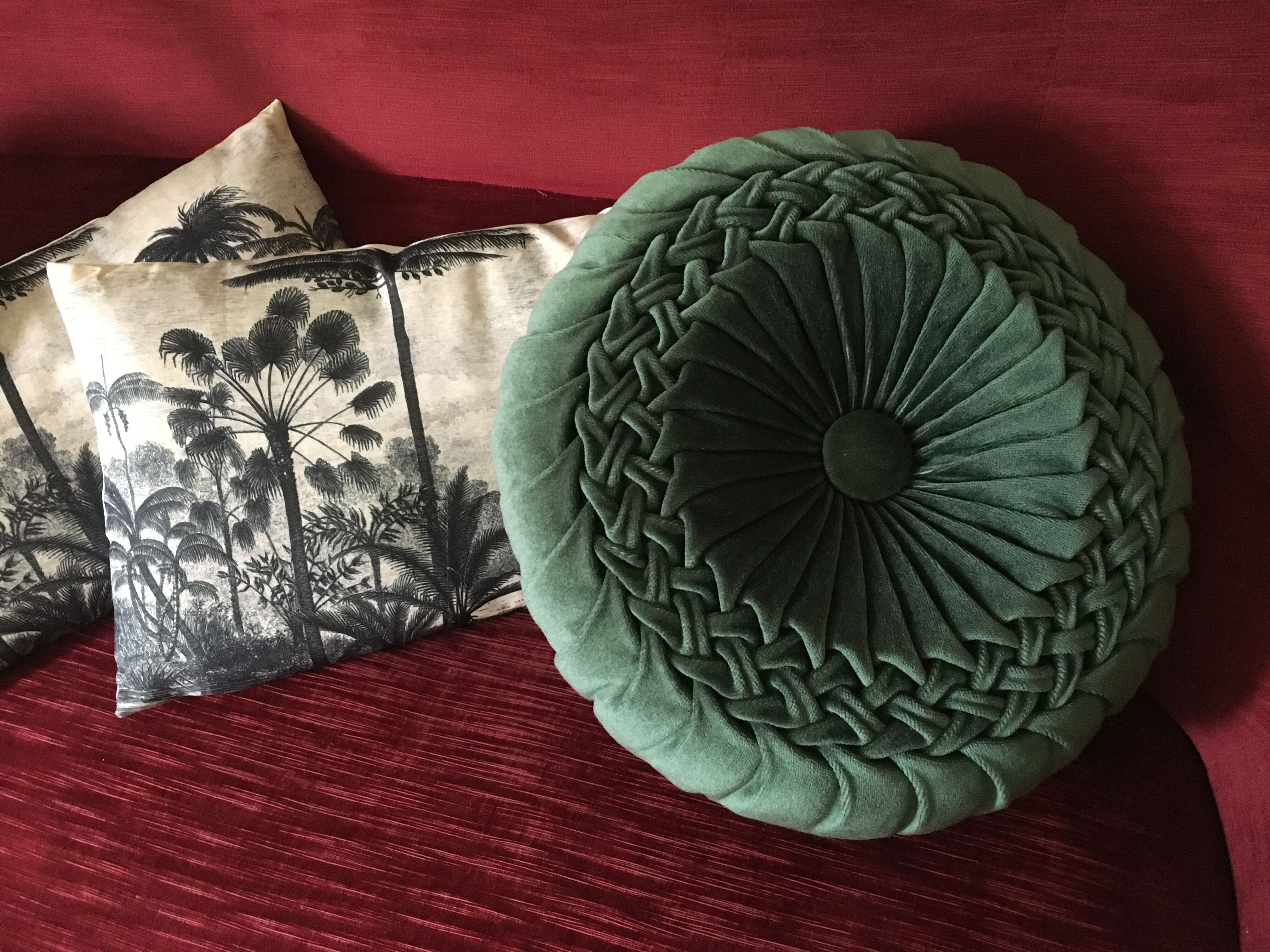 Vintage bottle green velvet round cushion