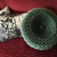 Vintage bottle green velvet round cushion