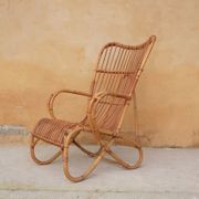 Vintage rattan chair by Louis Sognot