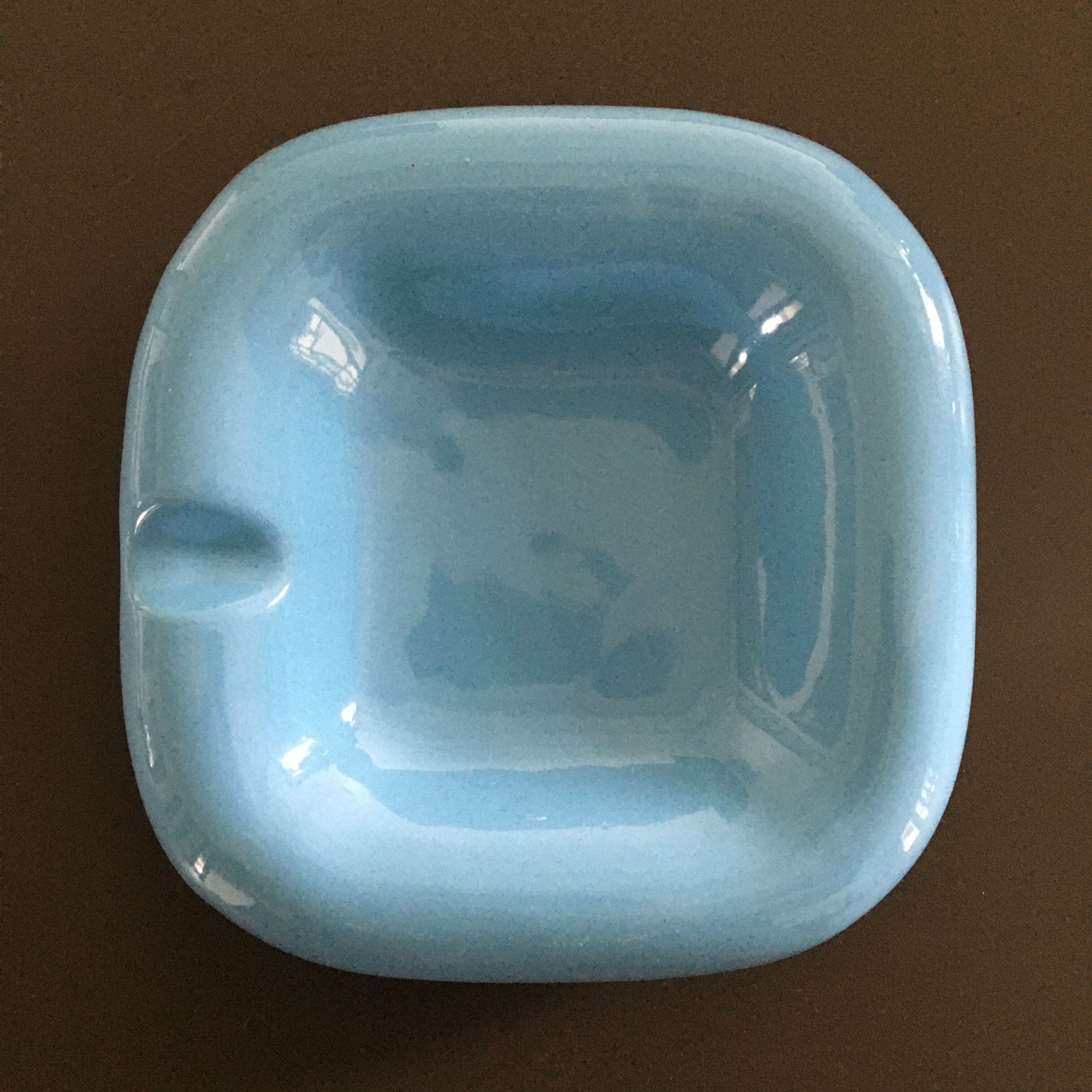 Empty turquoise earthenware pocket