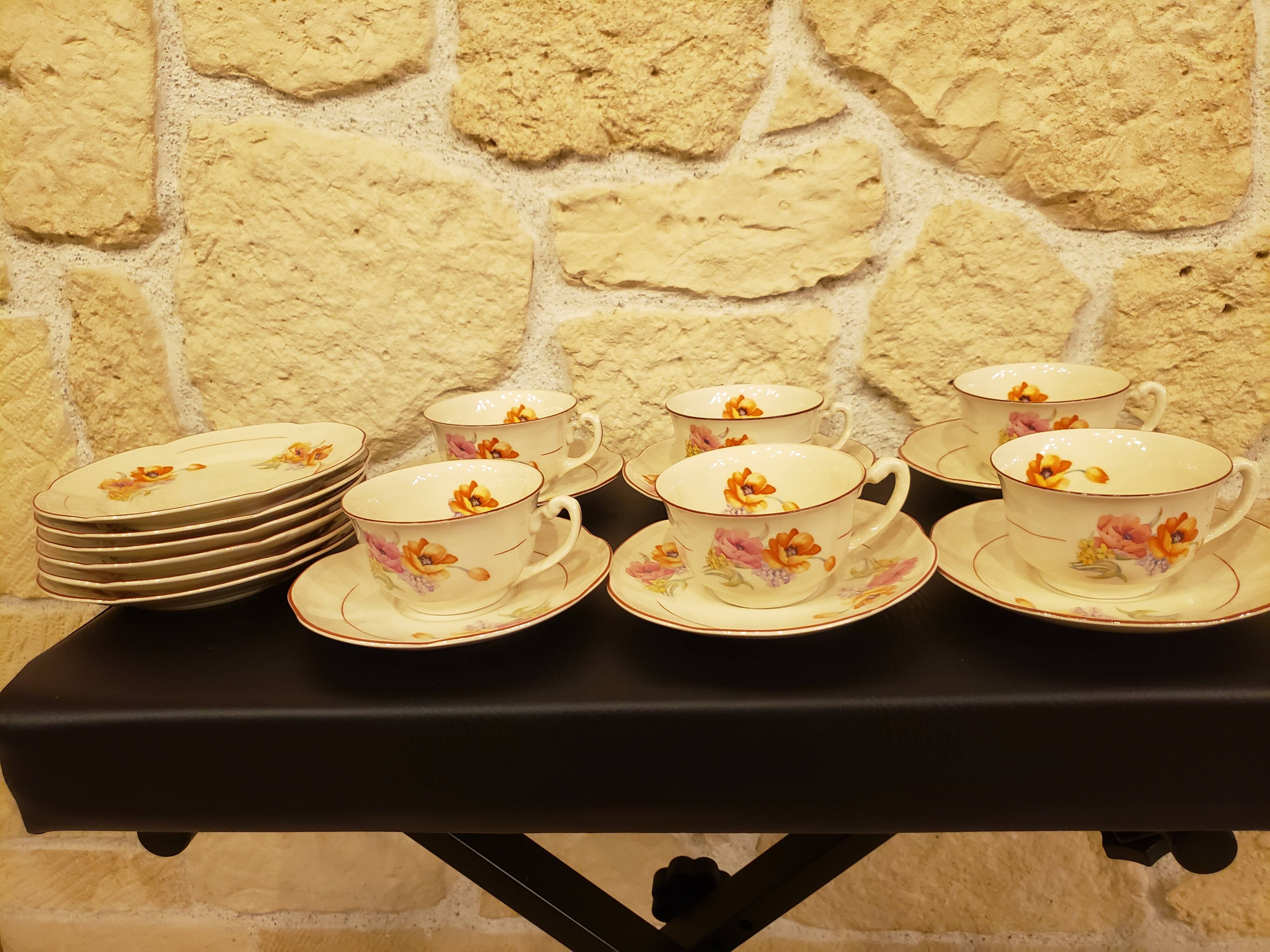 Service 6 people 6 plates, cups and saucers