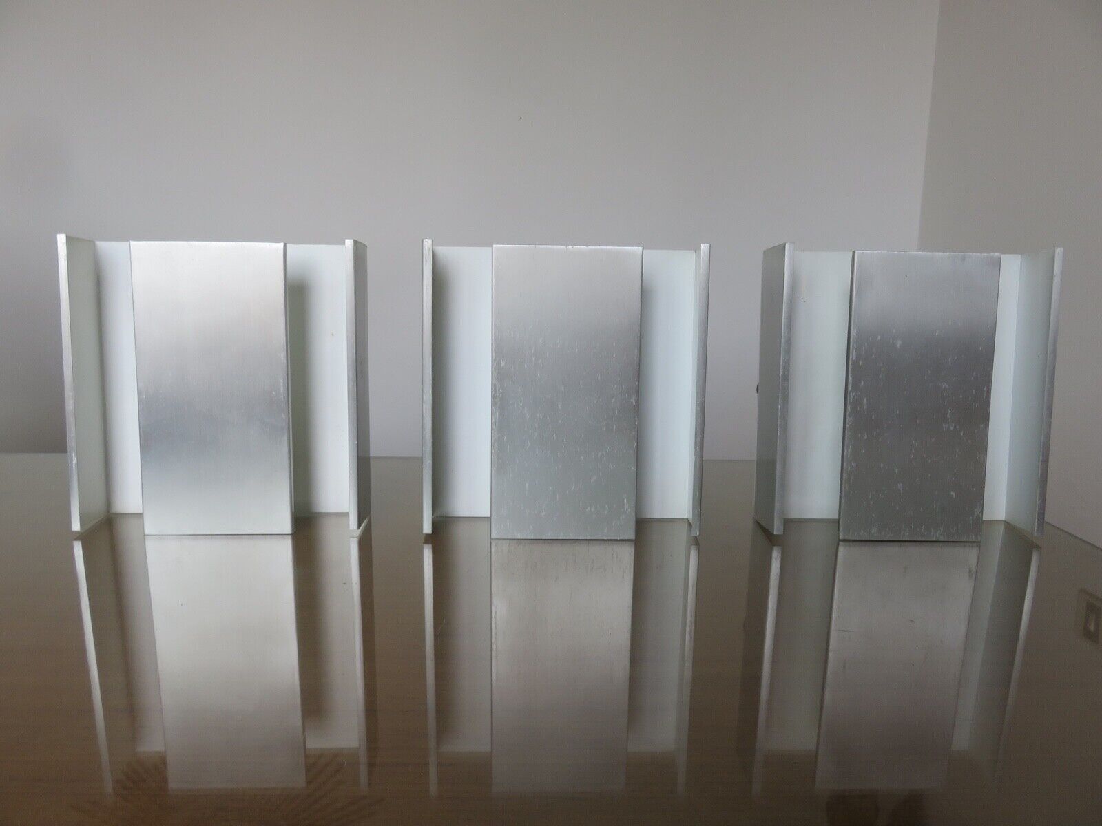 Series of 3 aluminum wall lamps, modernist, minimalist 70s
